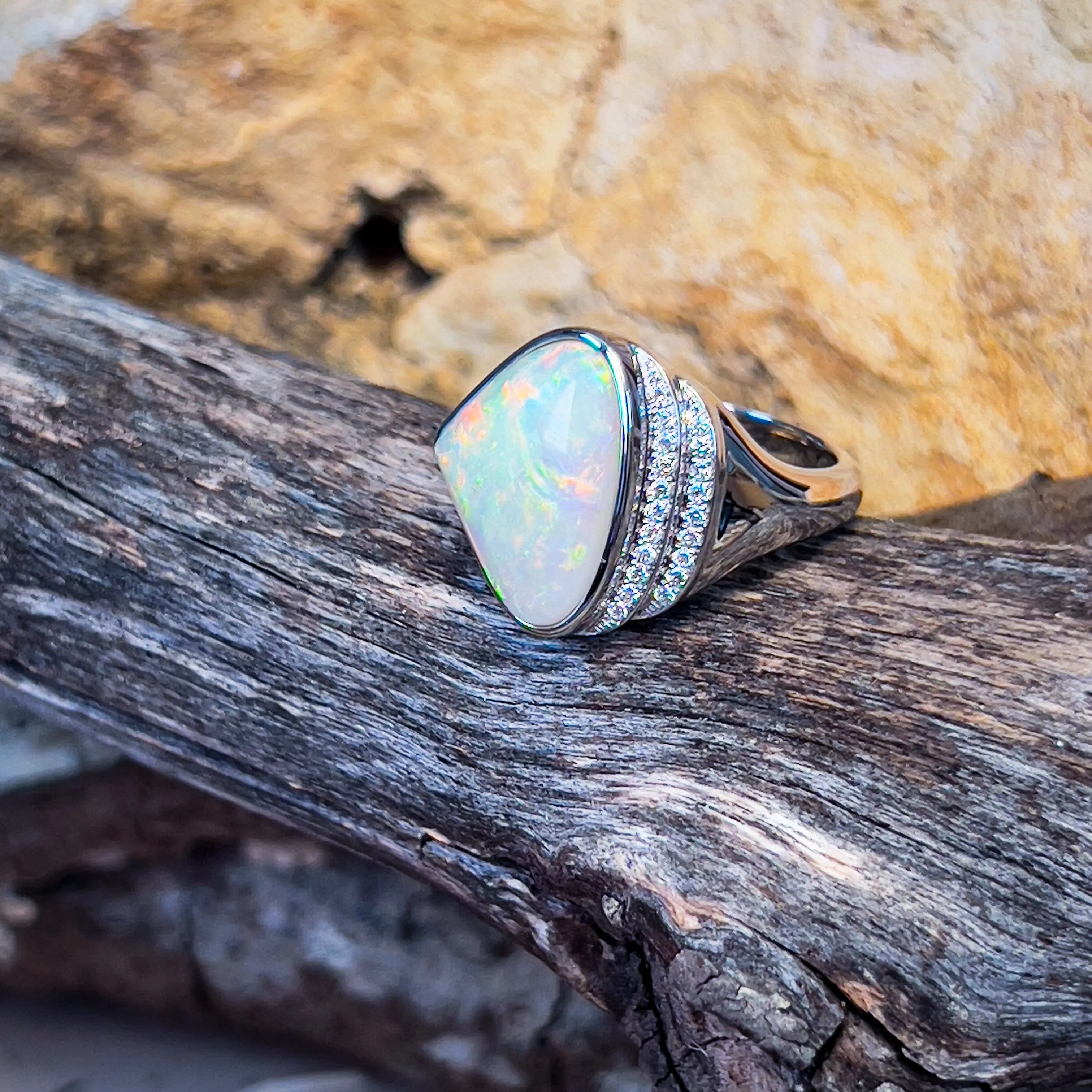 14kt White Gold Light Opal triangular and double row diamond ring