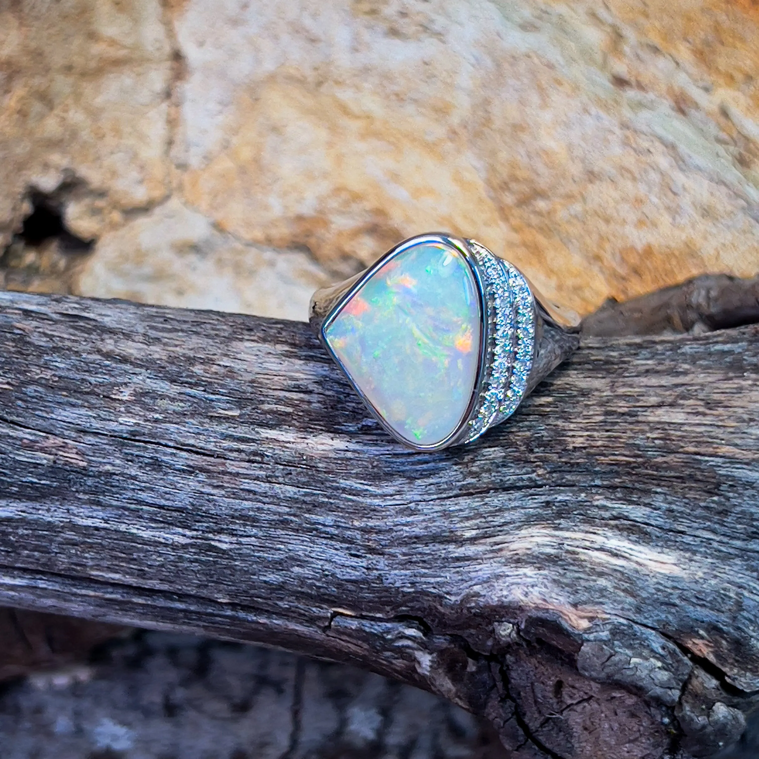 14kt White Gold Light Opal triangular and double row diamond ring