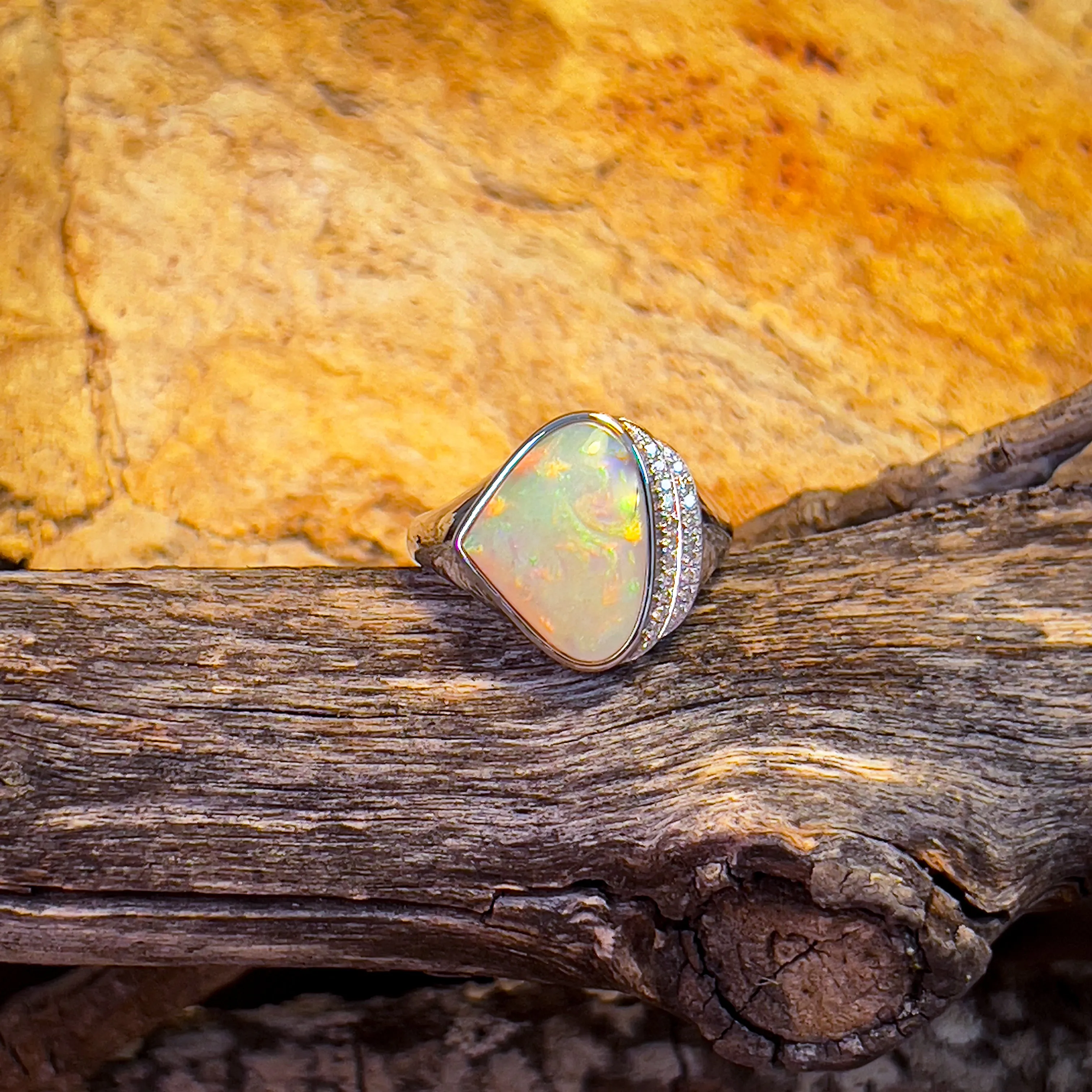 14kt White Gold Light Opal triangular and double row diamond ring