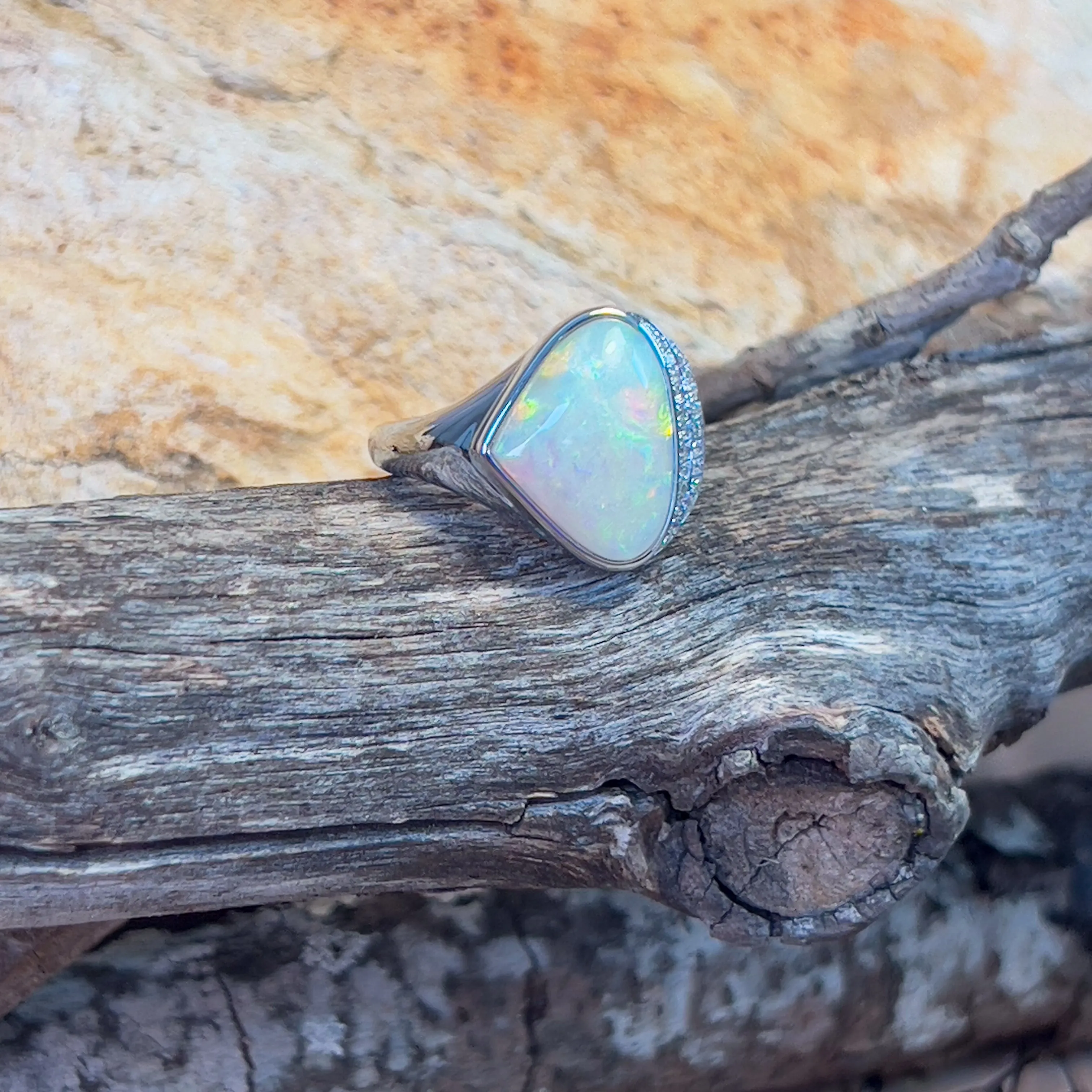 14kt White Gold Light Opal triangular and double row diamond ring
