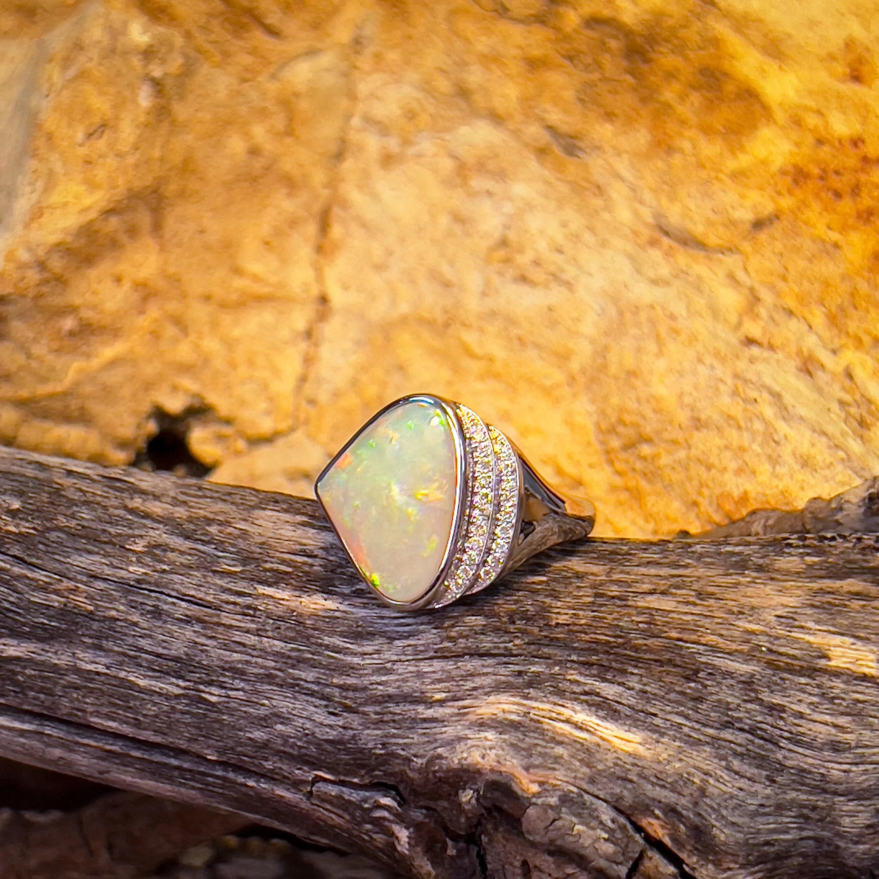 14kt White Gold Light Opal triangular and double row diamond ring