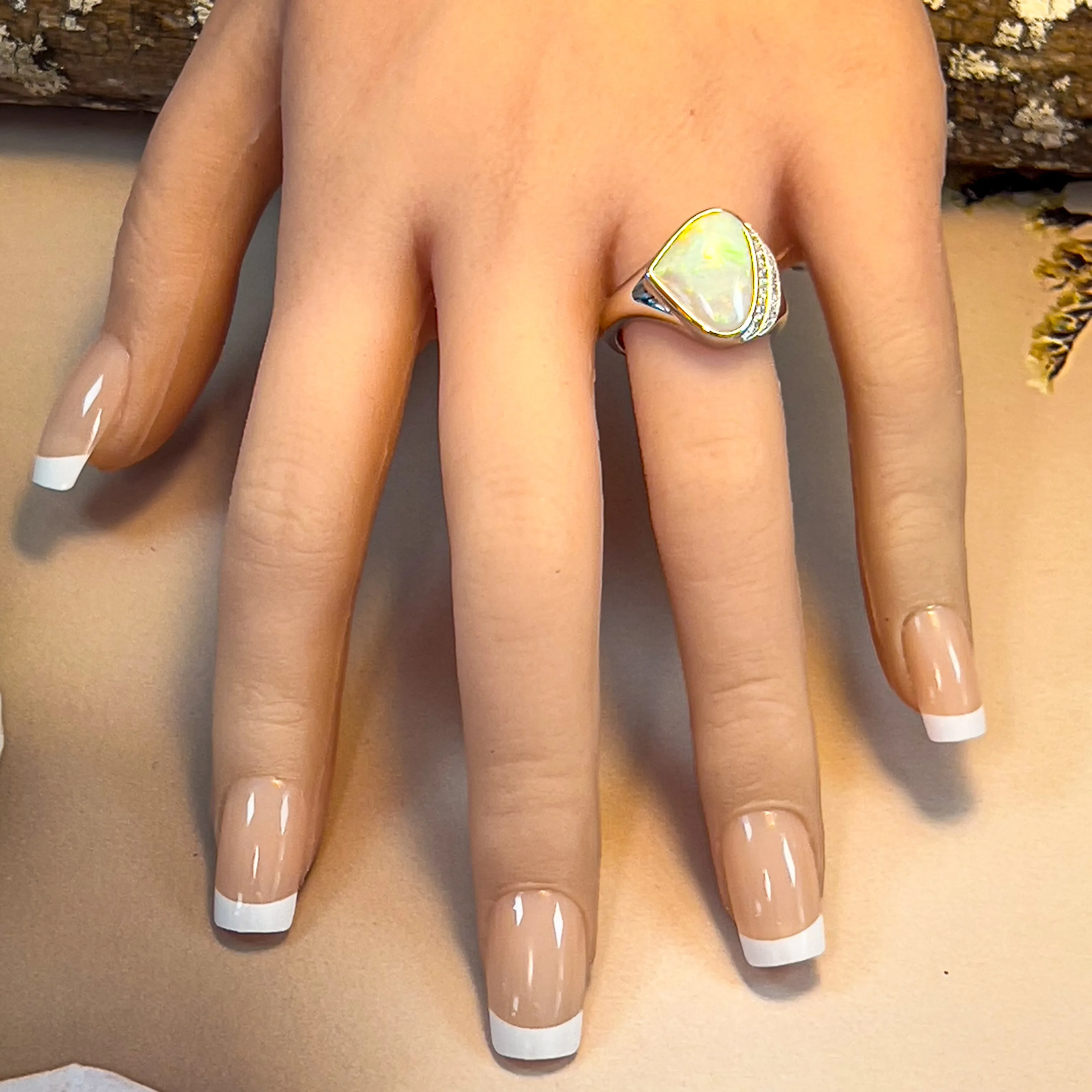 14kt White Gold Light Opal triangular and double row diamond ring