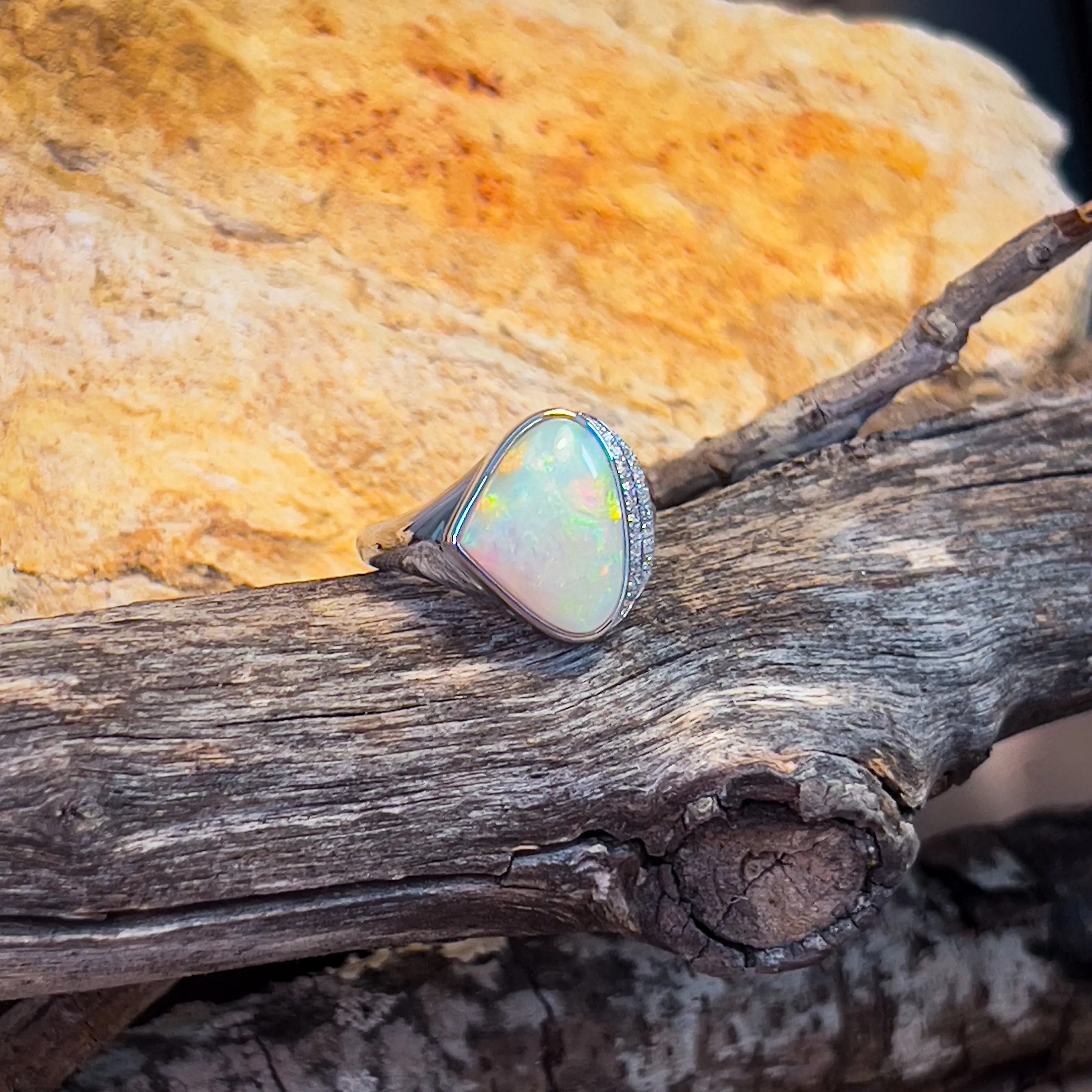 14kt White Gold Light Opal triangular and double row diamond ring
