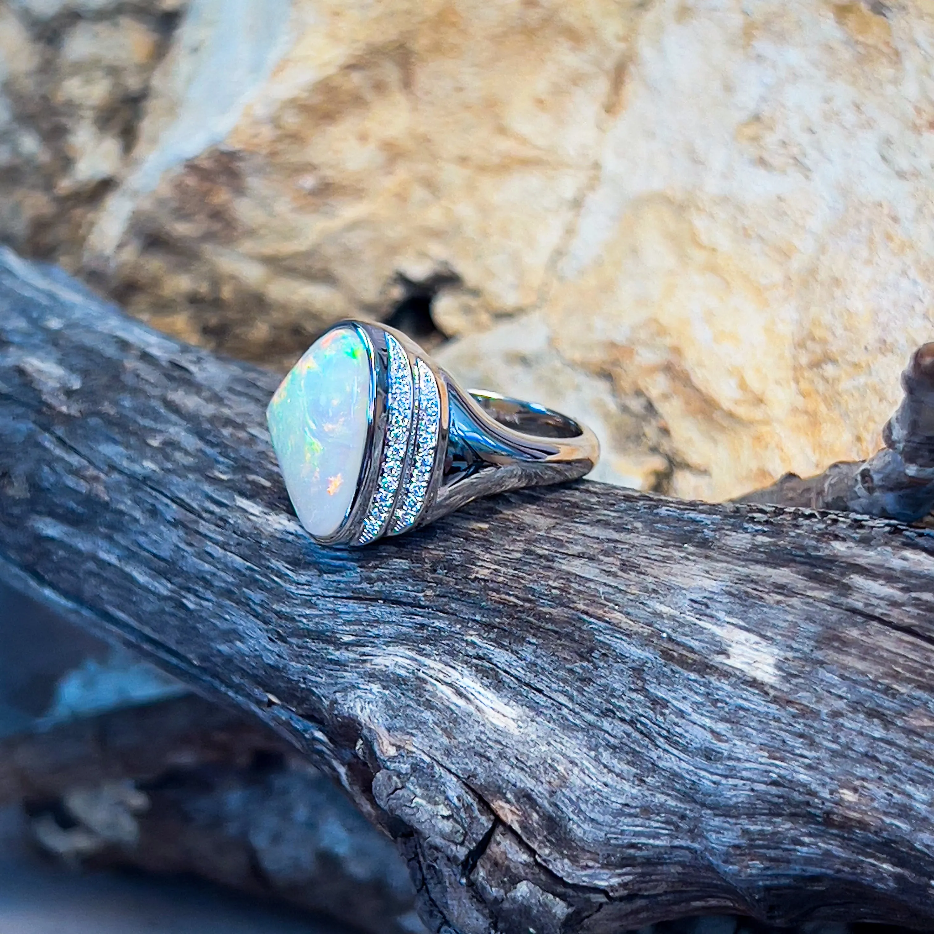 14kt White Gold Light Opal triangular and double row diamond ring