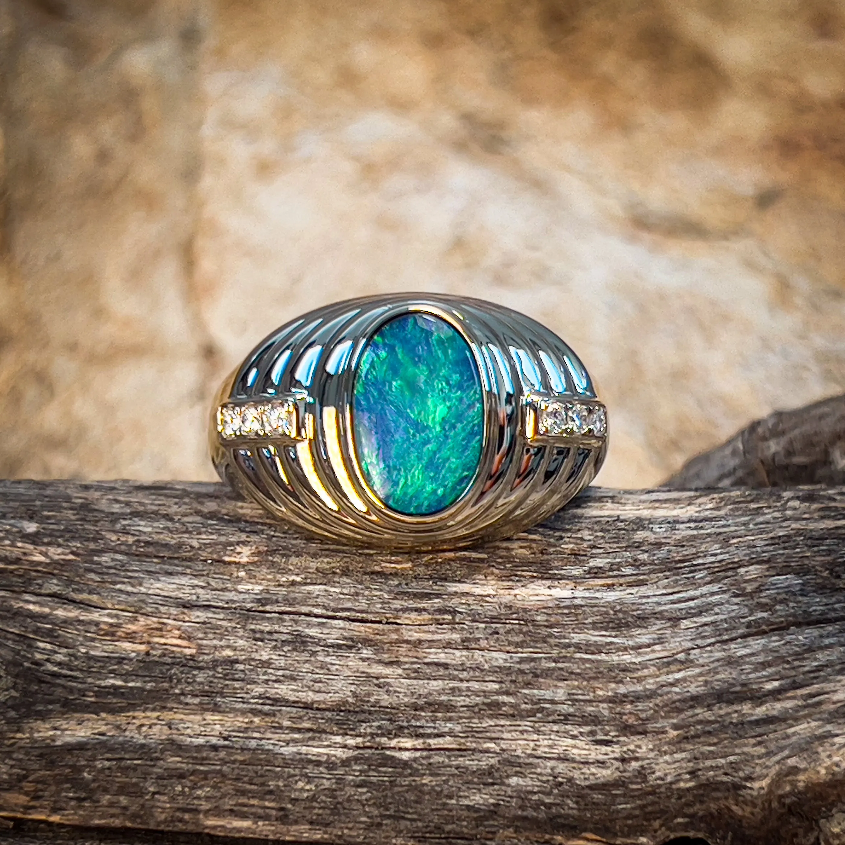 14kt Yellow Gold raised setting Black Opal and diamond ring