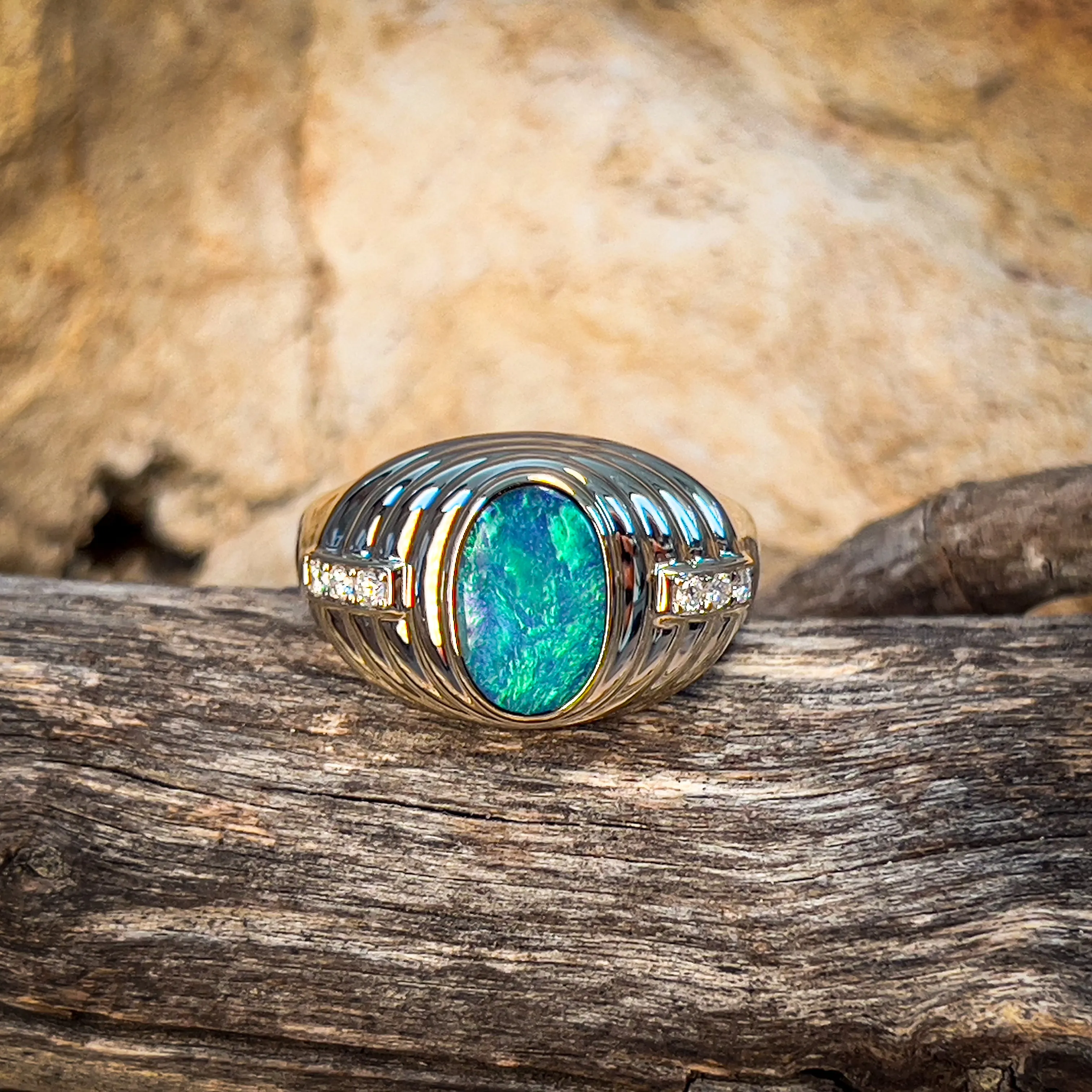 14kt Yellow Gold raised setting Black Opal and diamond ring