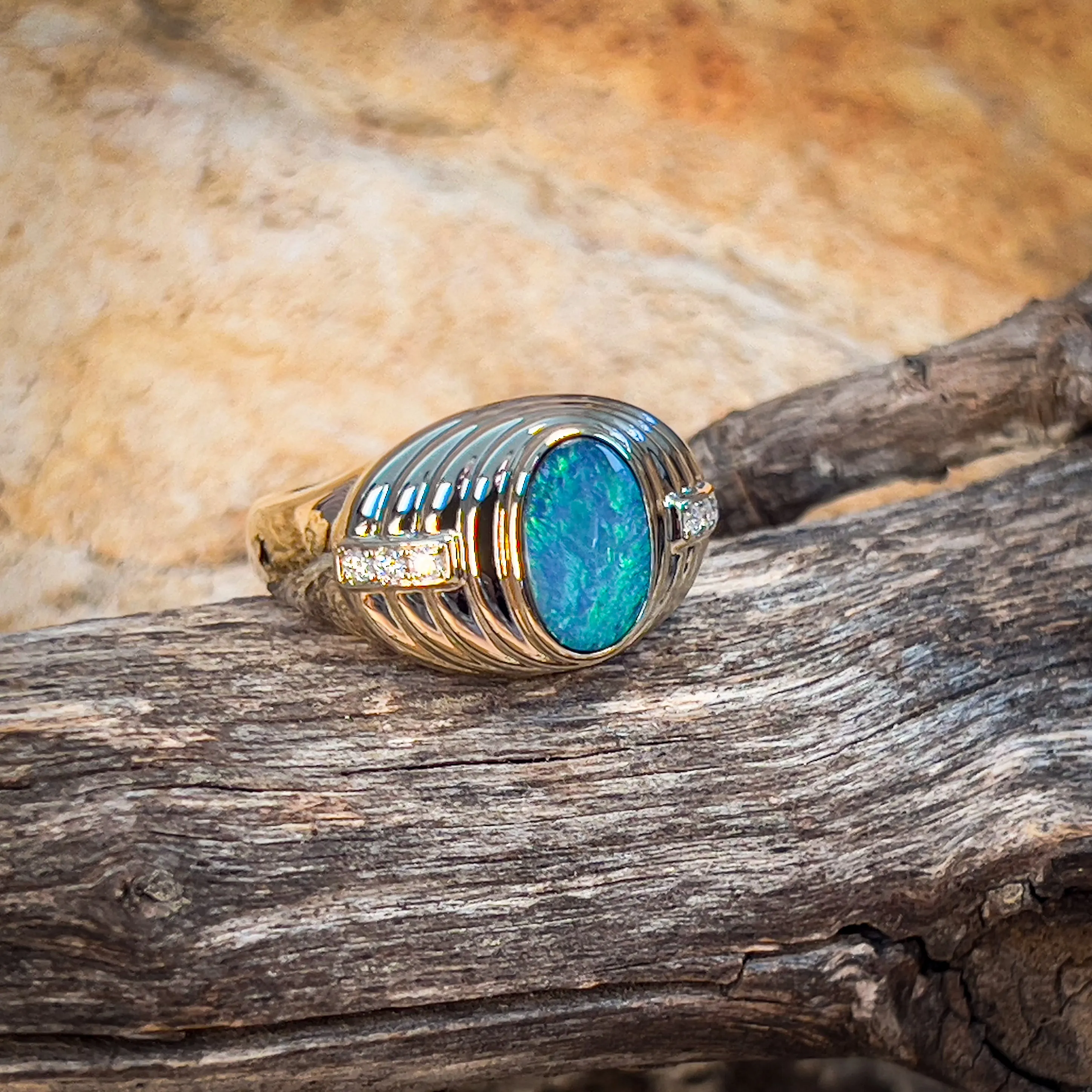 14kt Yellow Gold raised setting Black Opal and diamond ring