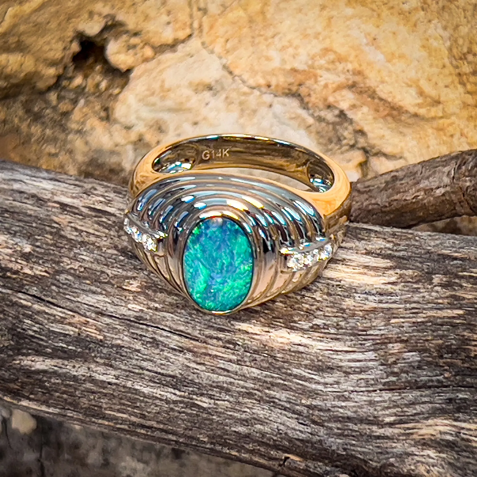 14kt Yellow Gold raised setting Black Opal and diamond ring