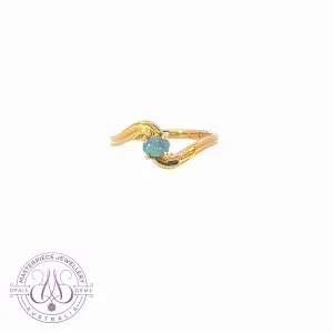 18kt Yellow Gold cross over black opal 0.15ct ring