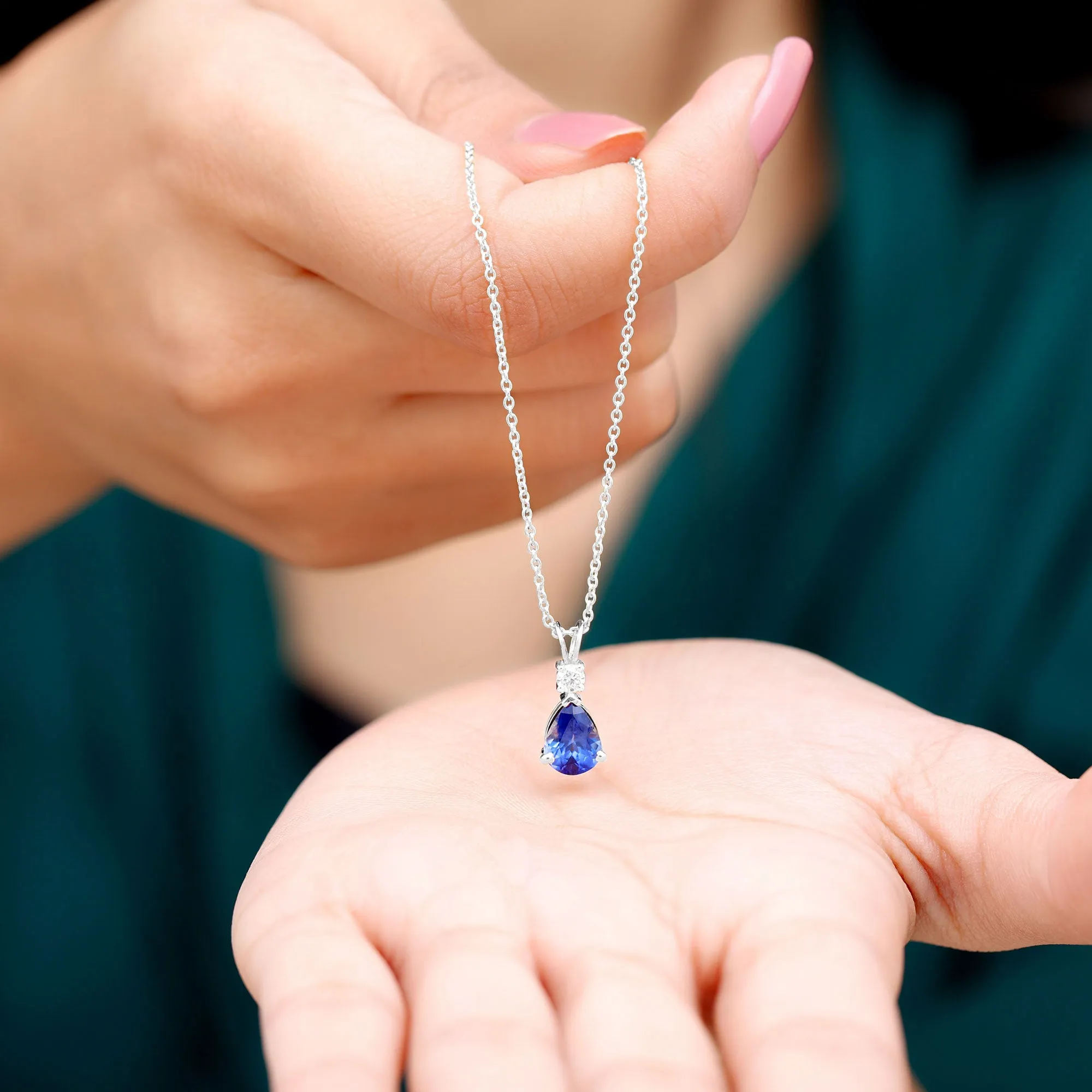 Created Blue Sapphire and Moissanite Modern Teardrop Pendant in Silver