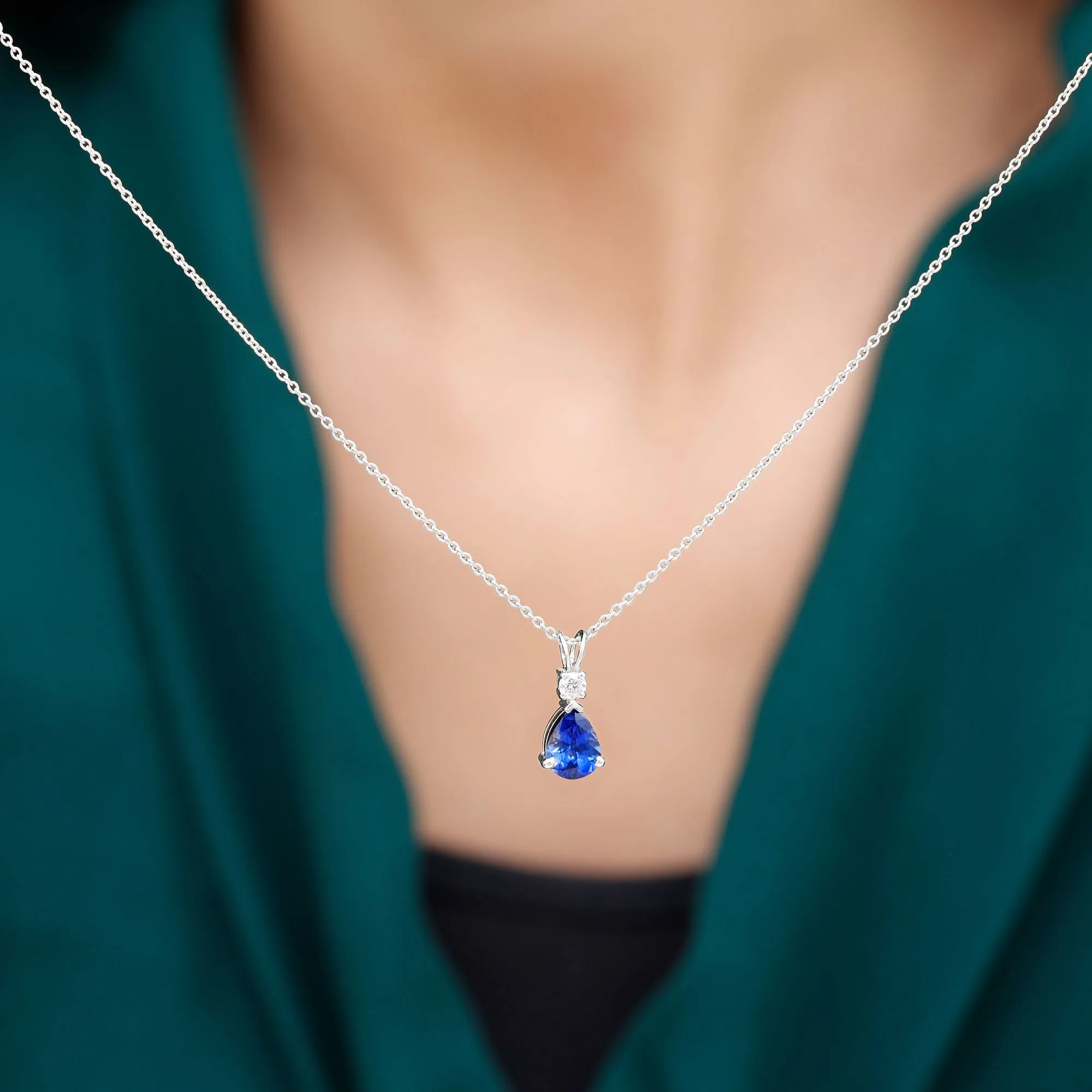 Created Blue Sapphire and Moissanite Modern Teardrop Pendant in Silver