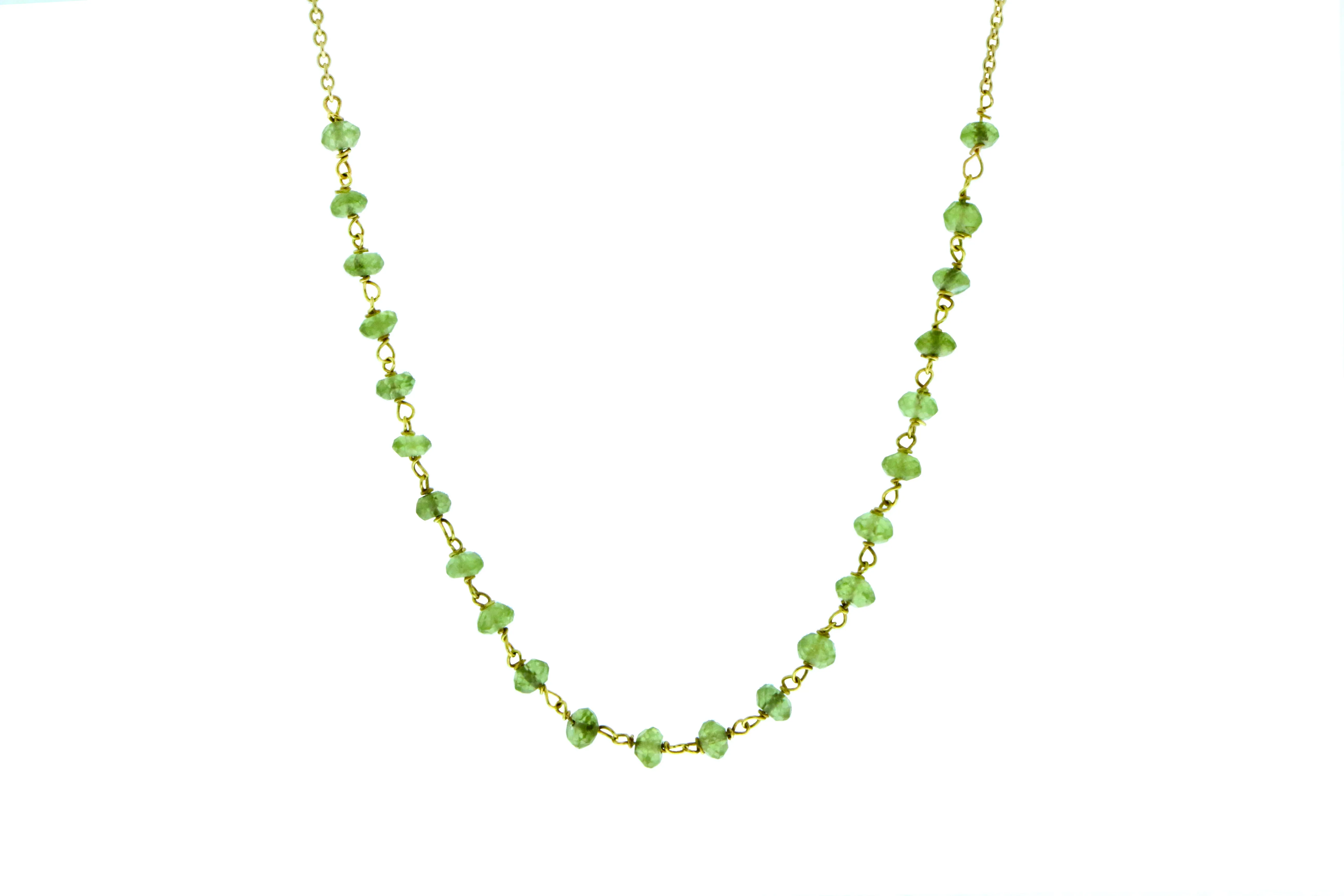 Yellow gold necklace with small garnets